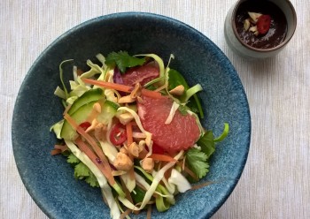 Shredded vegetable and red grapefruit salad with peanut and dark soy sauce dressing